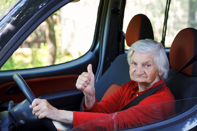 Senior woman holding car keys